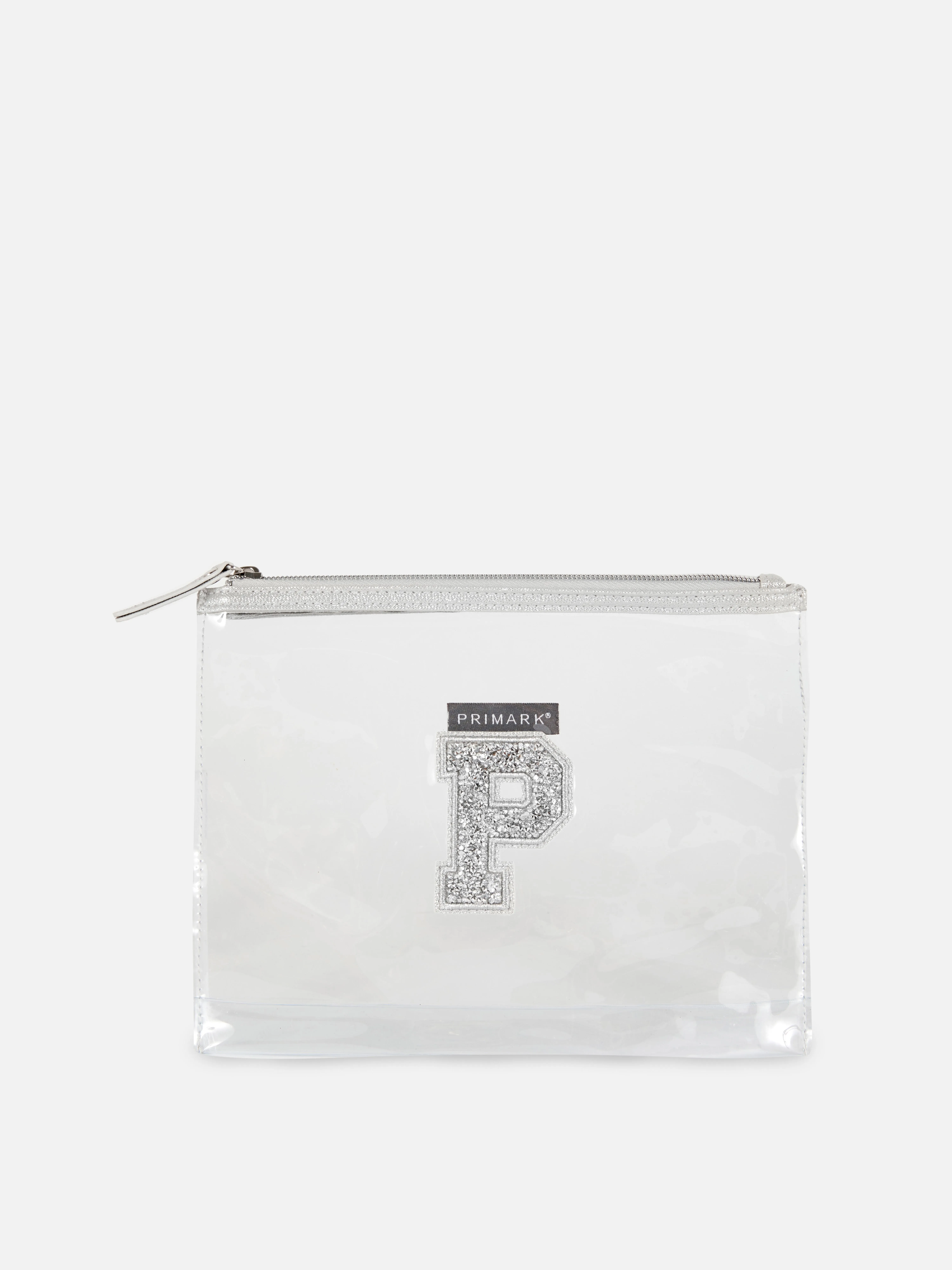 Bolsa transparente con inicial de purpurina