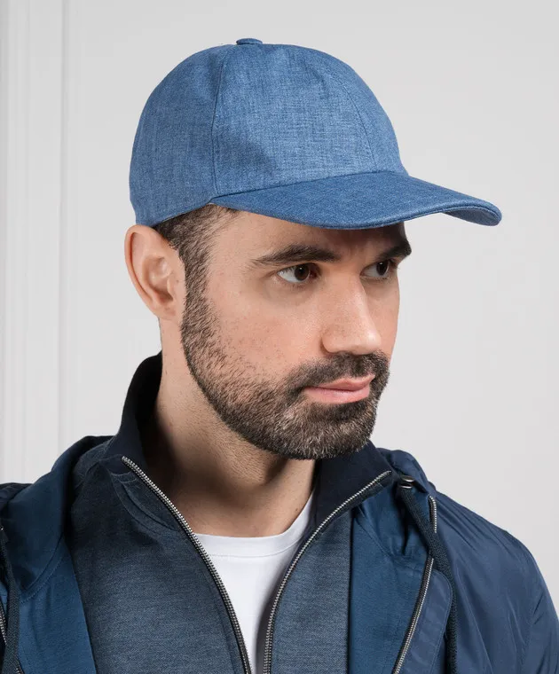 CAPOBIANCO Blue linen cap with metallic logo