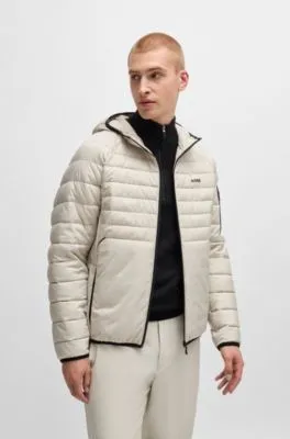 Chaqueta acolchada repelente al agua con detalles reflectantes decorativos