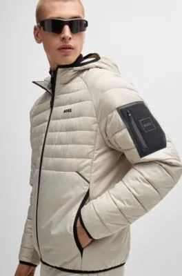 Chaqueta acolchada repelente al agua con detalles reflectantes decorativos