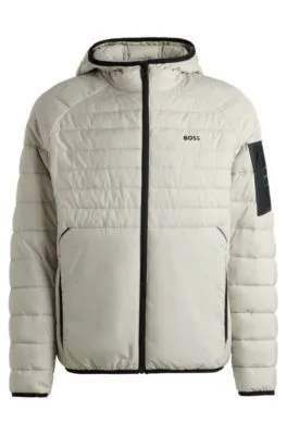 Chaqueta acolchada repelente al agua con detalles reflectantes decorativos