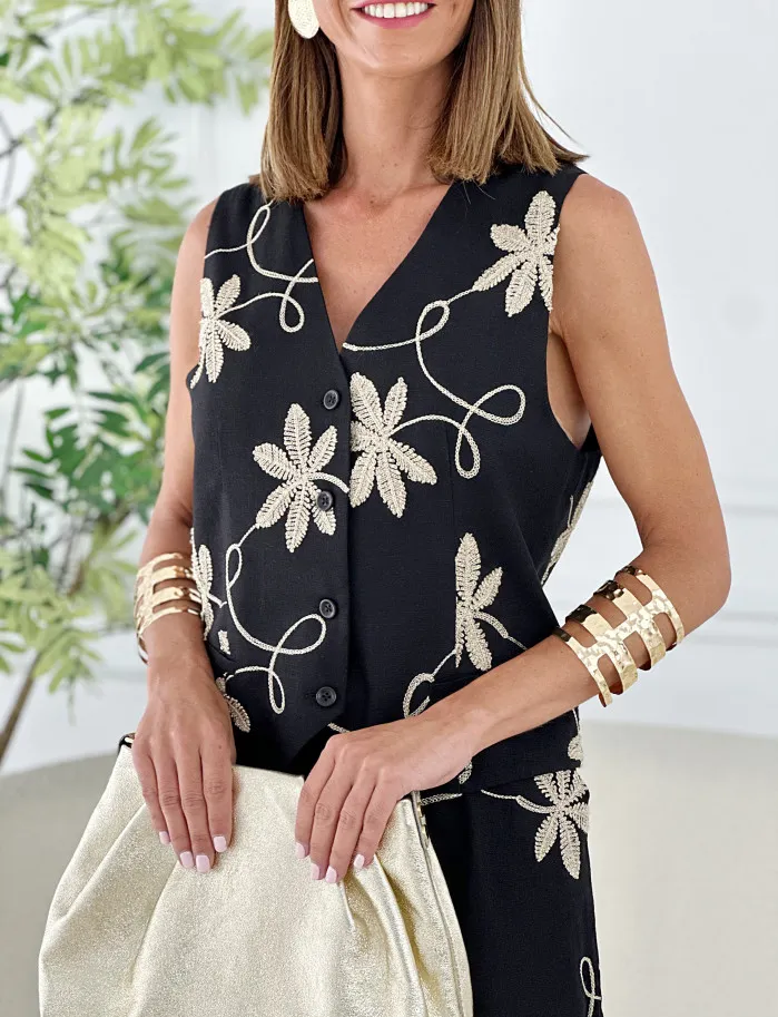 Conjunto negro hojas doradas