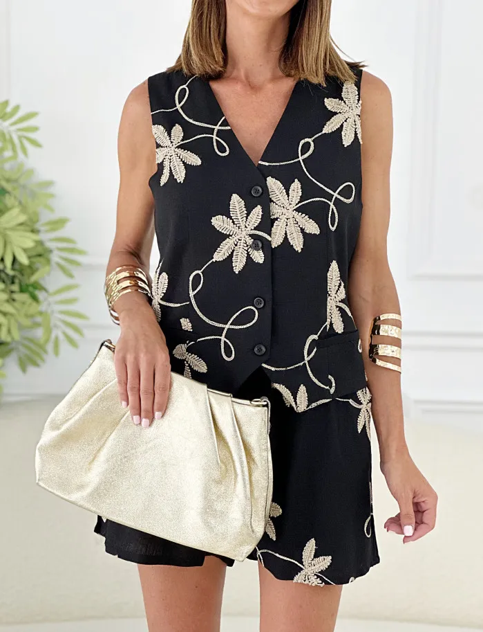 Conjunto negro hojas doradas